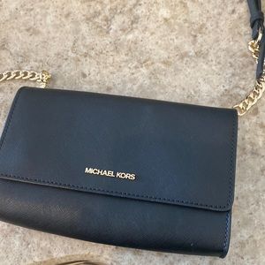 Black leather with gold hardware Michael kors crossbody